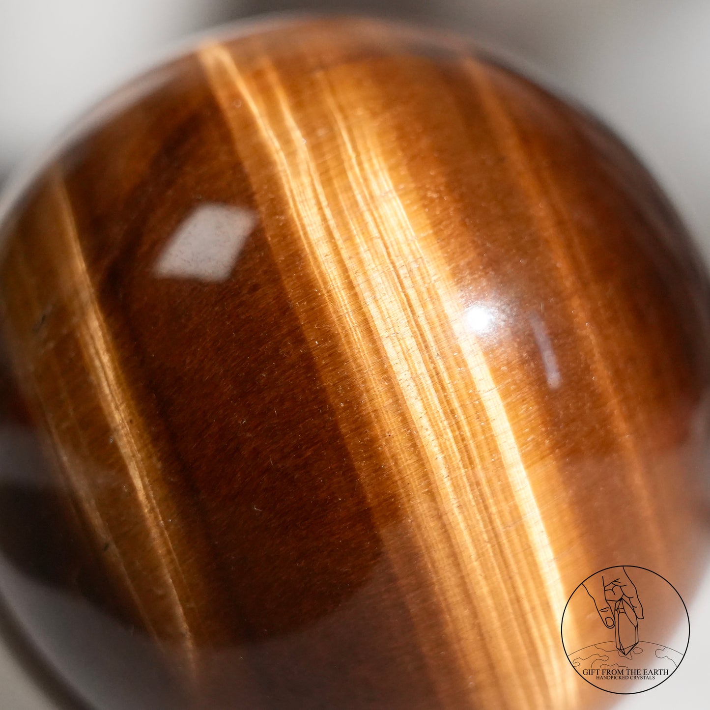 Yellow tiger's eye sphere