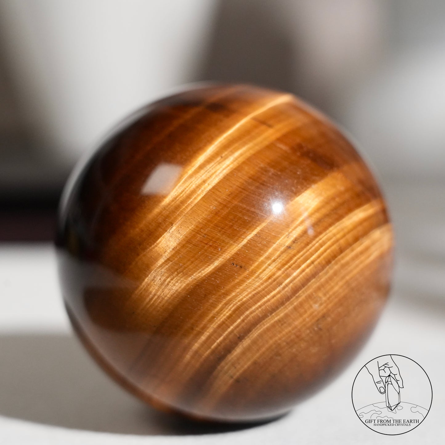 Yellow tiger's eye sphere