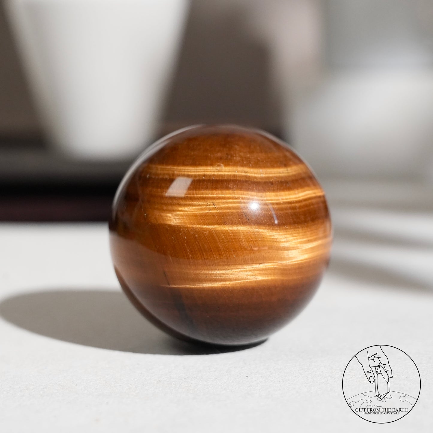 Yellow tiger's eye sphere
