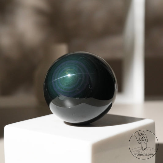 Silver sheen obsidian sphere