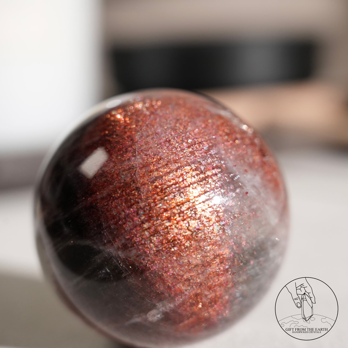 Golden sunstone sphere