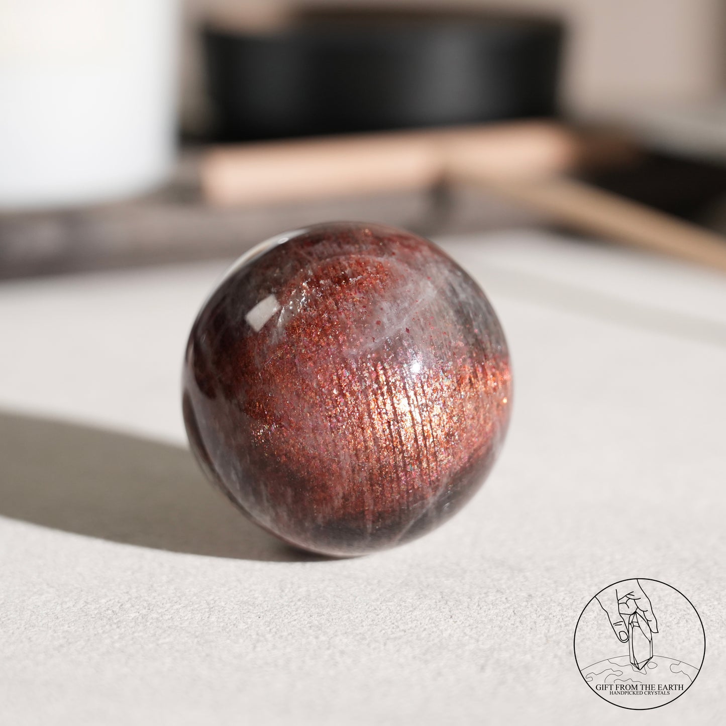 Golden sunstone sphere