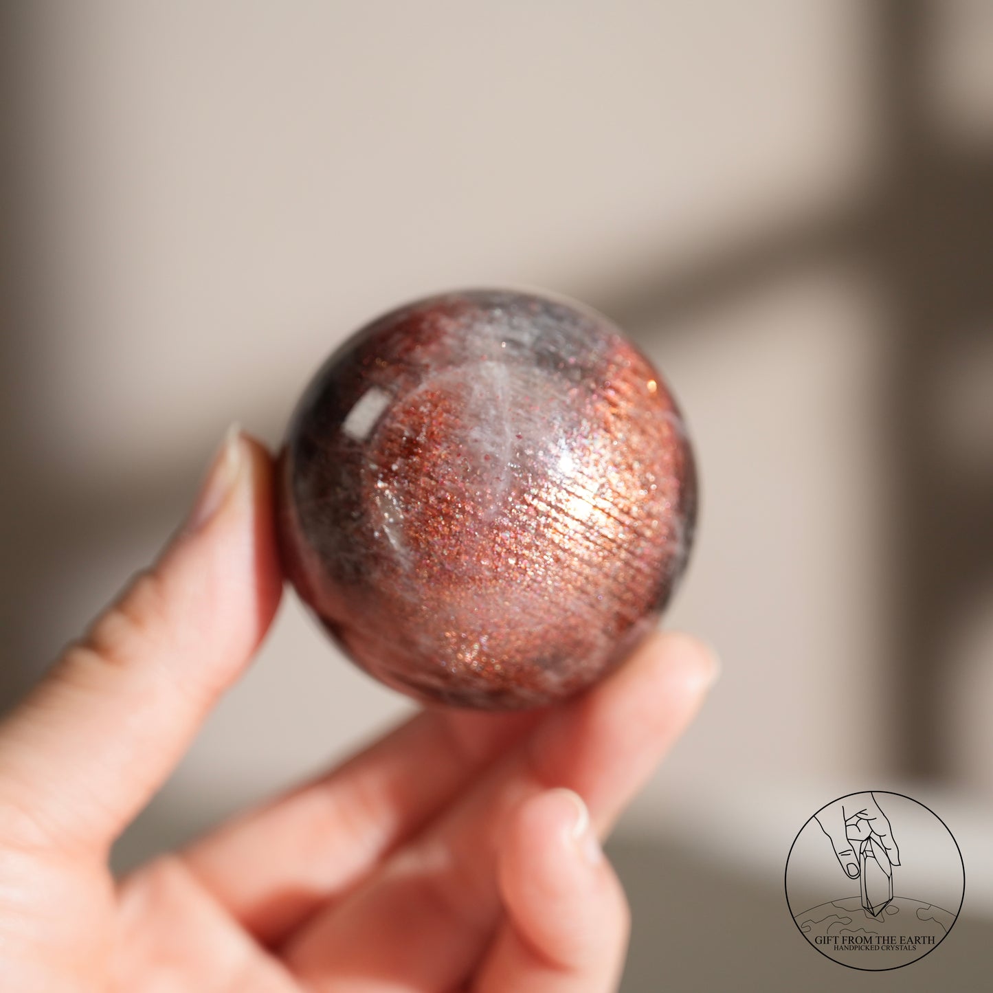 Golden sunstone sphere